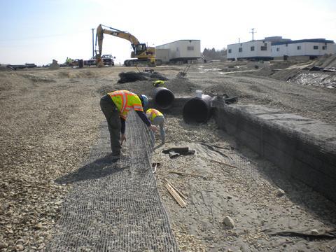 How to install large pipe in a stormwater detention system.