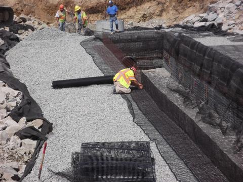 D. W. White Construction build undergound stormwater detention systems in Waltham, MA.