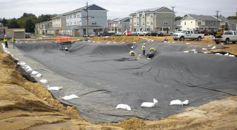 Geomembrane Installation typical for a stormwater system located over karst limestone.